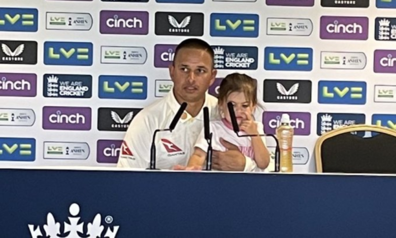 Ashes hero Usman Khawaja does press conference with daughter on his lap